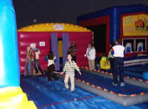 15 X 30 Inflatable Runway & Dressing Room The Inflatable Runway is an exciting new attraction complete with changing rooms and lighted runway for kids or adults. Be fashion icons or just plain silly. Excellent for Dress up, Fashion Shows, Awards, Magic Shows, Entertainers, Karaoke, Rock Band, Guitar Hero, American Idol or whatever your can think of.