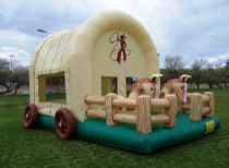 14 X 21 Wild West Bouncer with inflatable horses on front Add inflatable pony hops for $25 each (must be ridden on grass or inside gym floor)