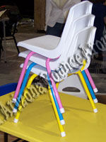 Multi colored kids stackable chairs $1.49 ea